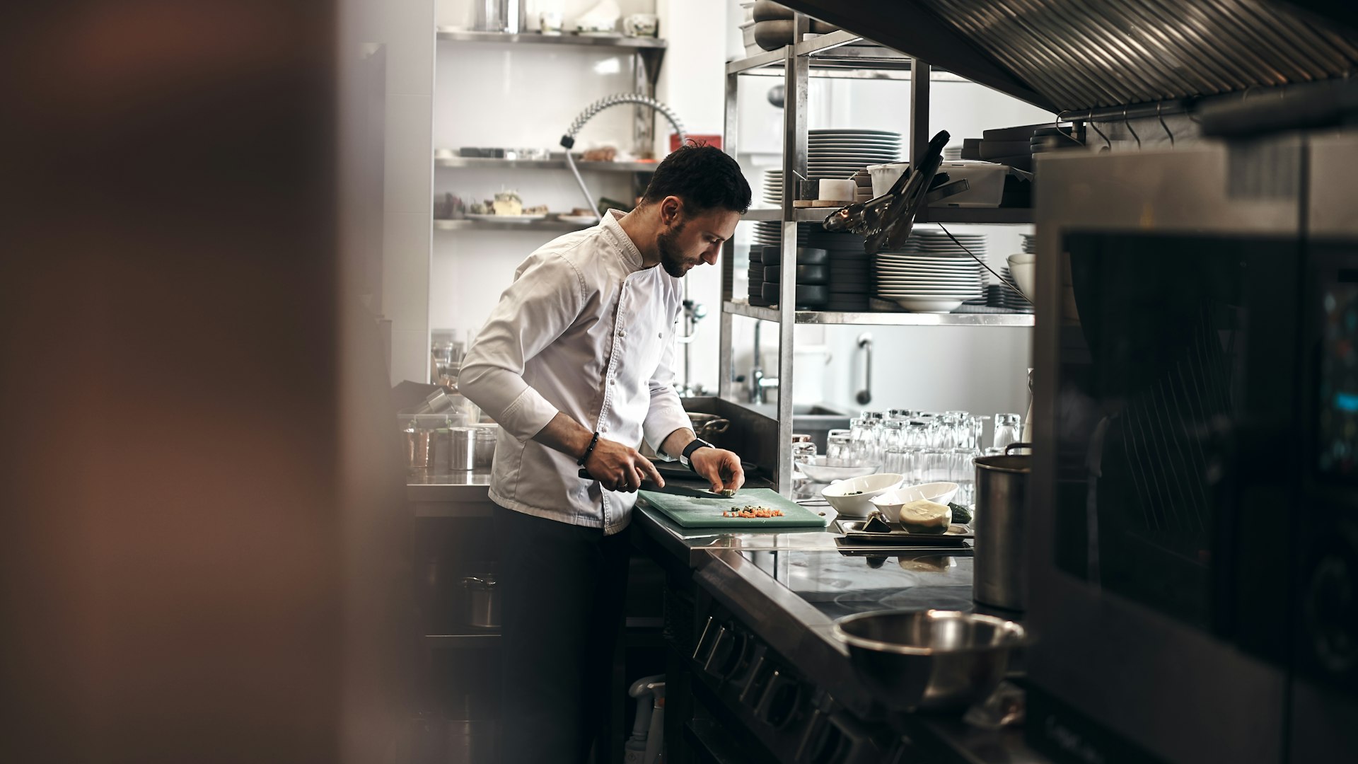 Chef chopping fresh vegetables