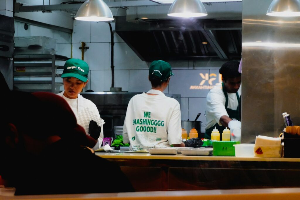 Restaurant staff preparing food in a professional kitchen