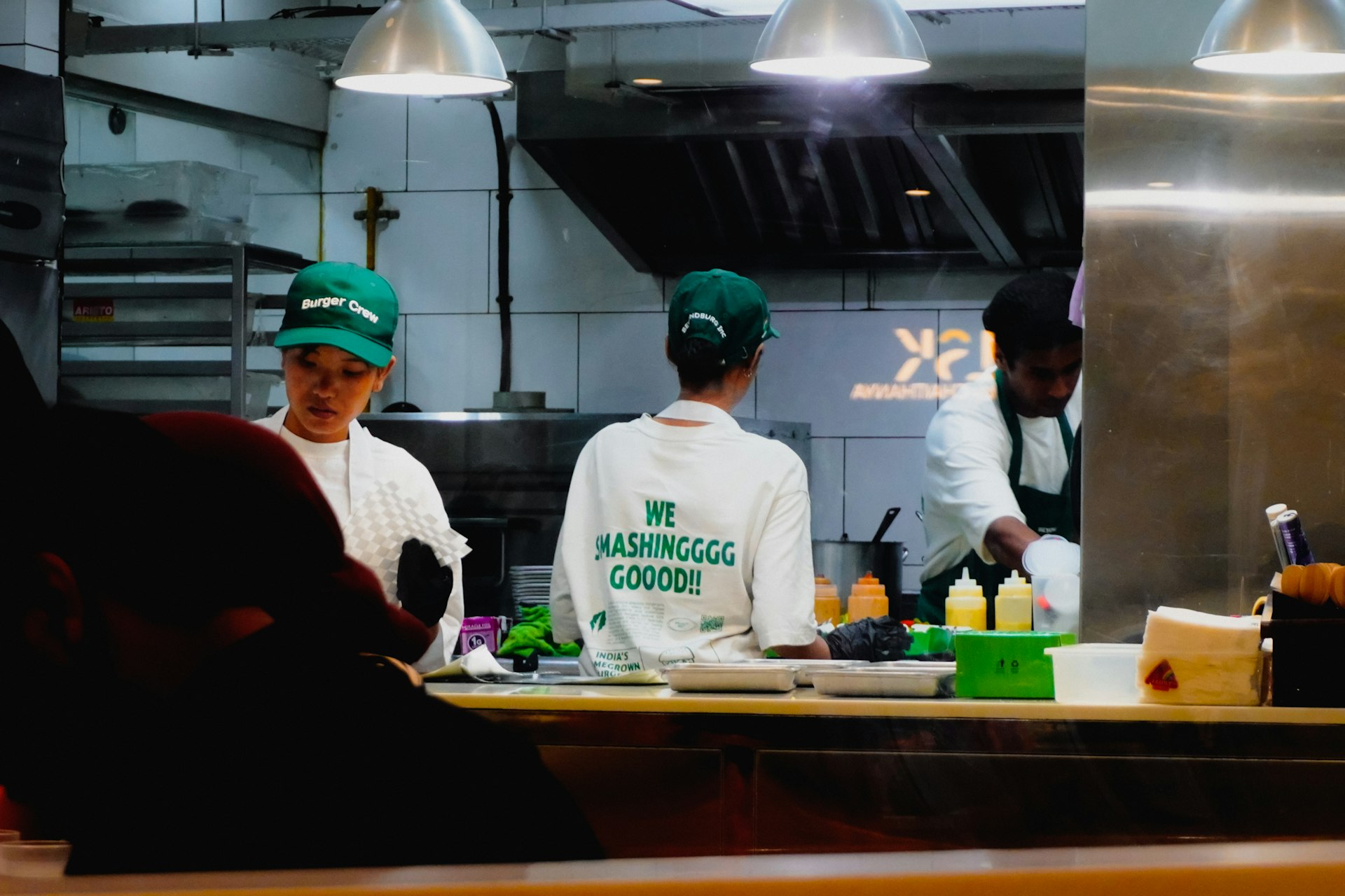 Restaurant staff preparing food in a professional kitchen
